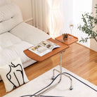 POOTOO's Multifunctional Side Table in the Living Room A stylish addition to your living space, this multifunctional side table offers convenience and elegance, perfect for holding drinks, snacks, or decorative items.