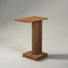 Side View White Background Image of Pootoo's C-shaped Side Table, clearly showcasing its unique silhouette and design details, ideal for modern home settings.