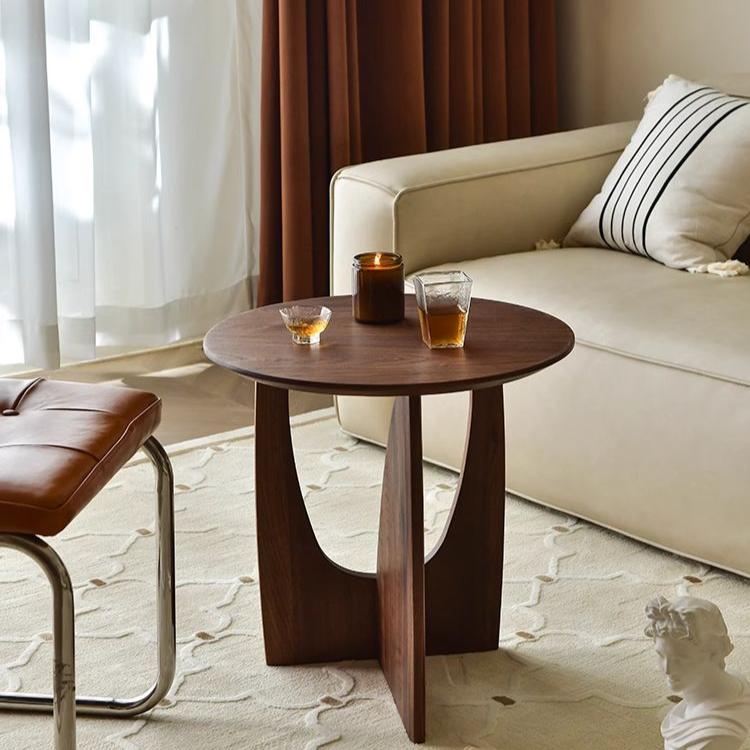 POOTOO's Vintage Solid Wood Round Side Table Coffee Table Next to the Sofa Display Image Showcasing the perfect placement of this coffee table beside your sofa, adding functionality and style while creating an inviting atmosphere in your living space.