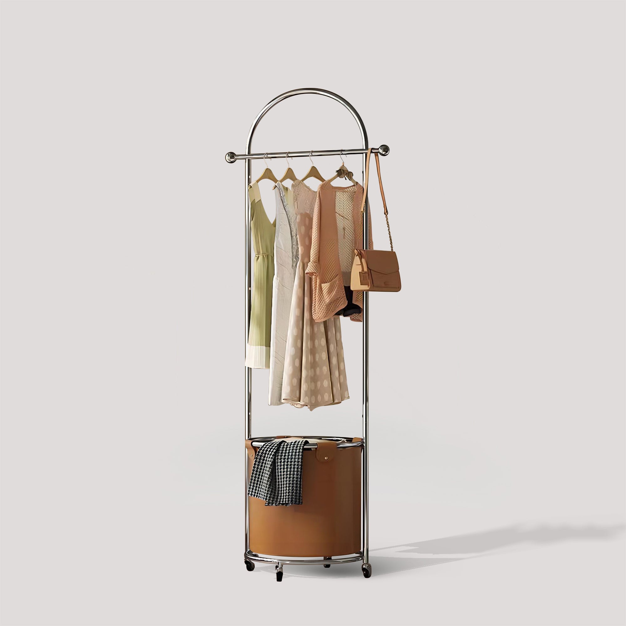 White Background Image of Pootoo's Mobile Round Floor Coat Rack with Laundry Bag, showcasing its unique round design and practical laundry bag feature, suitable for modern home settings.