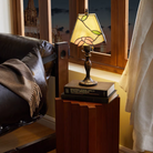 Pootoo's Checkerboard Side Table as a Nightstand, showcasing its unique design and practicality, perfectly suitable for holding books, lamps, and small items, enhancing the overall style of the bedroom.