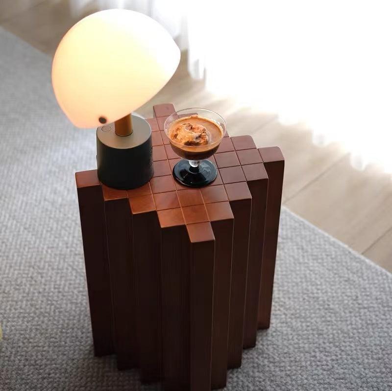 Pootoo's Checkerboard Side Table paired with Coffee, creating a cozy and relaxing atmosphere, with its unique design making it an ideal space for enjoying coffee time.