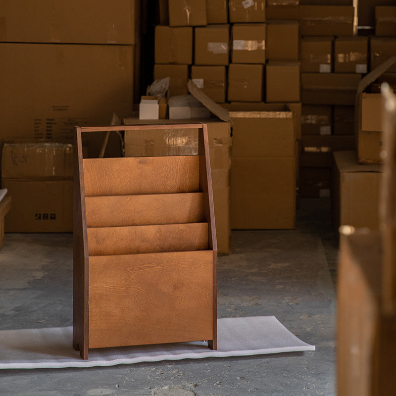 POOTOO's Ocean Plywood Magazine Rack Left Side Display Image Highlighting the sleek profile and craftsmanship of this magazine rack, designed to enhance your space while providing stylish storage for your favorite reads.