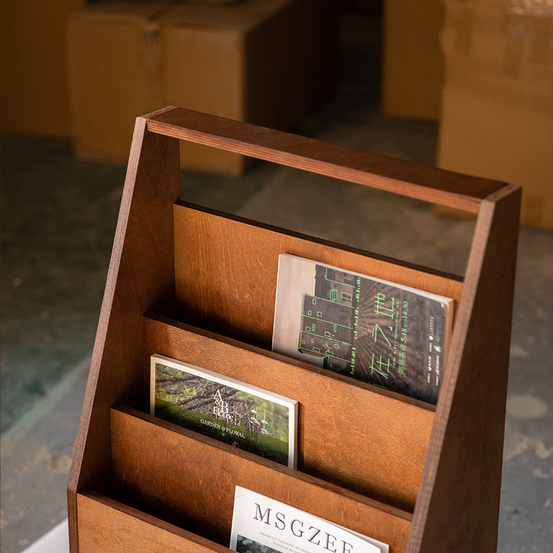 POOTOO's Ocean Plywood Magazine Rack with Books Detail Image Highlighting the spacious design and functionality of this magazine rack, elegantly displaying your favorite books while enhancing your home decor.